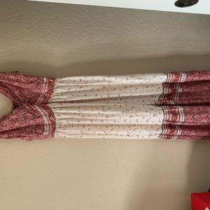 Medium sized floral sundress, brand is called Angie.